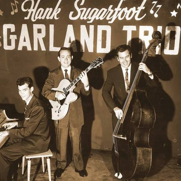 Трио Хэнка Sugarfoot Гарланда